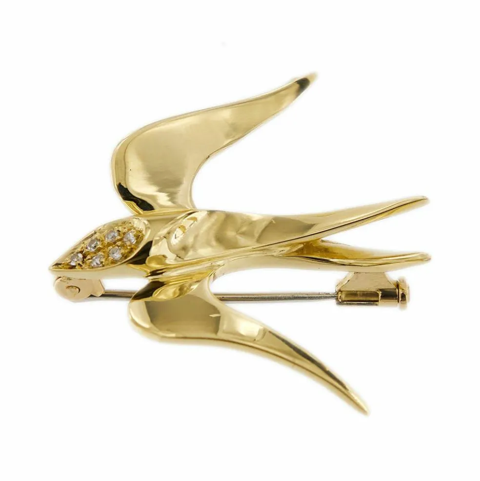 Broche hirondelle diamants