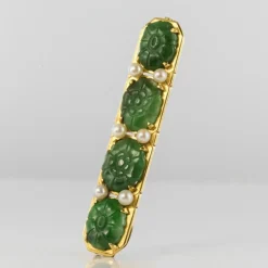 Broche ligne de jades et perles