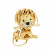 Broche Lion en or jaune et blanc, émeraudes, diamants et onyx
