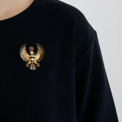Broche motif égyptien en or jaune et émail