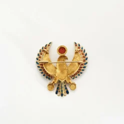 Broche motif égyptien en or jaune et émail