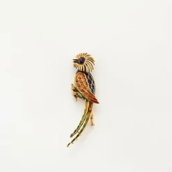 Broche motif oiseau en or jaune et émail