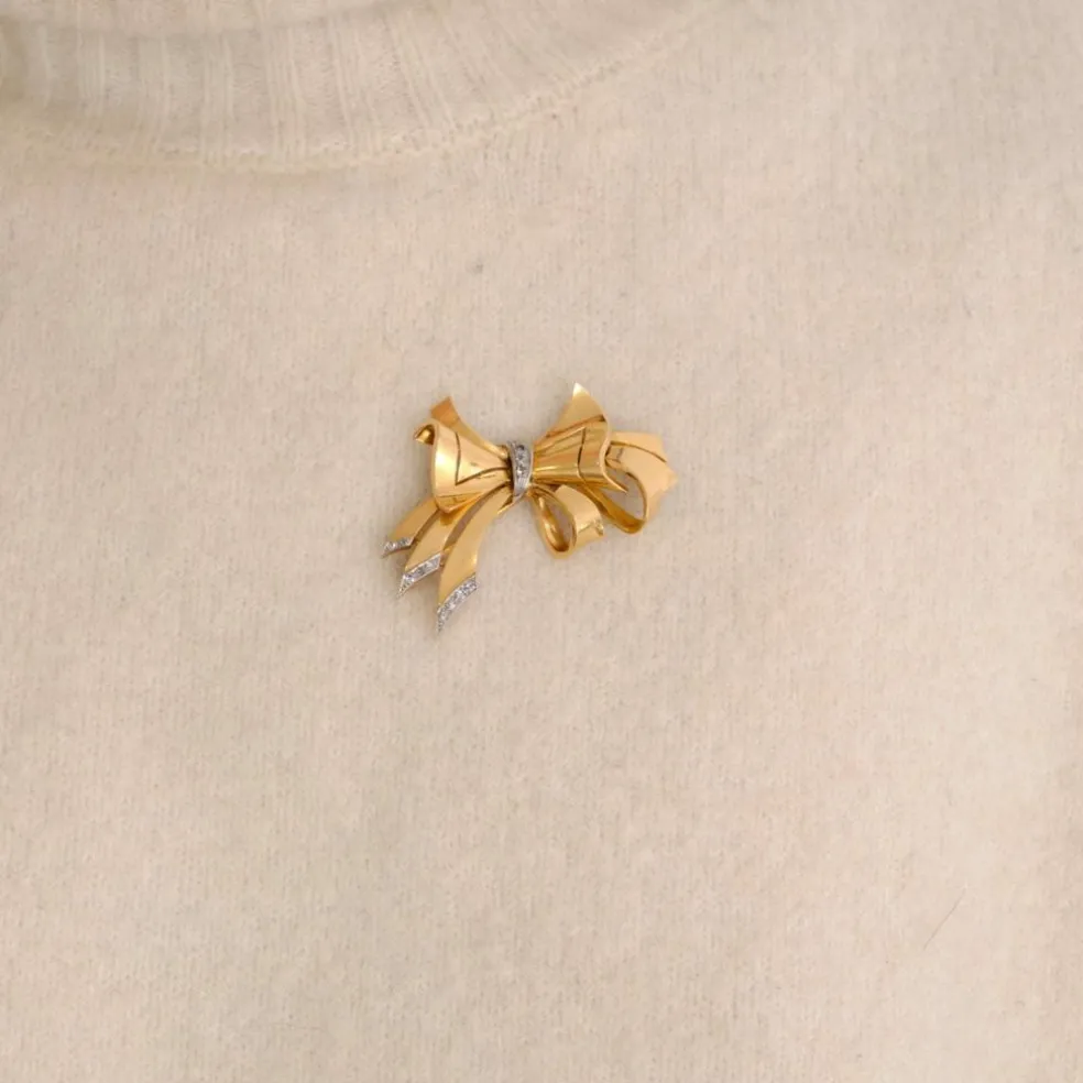 Broche noeud or platine 1940.