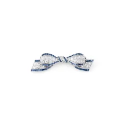 Broche nœud Art Déco platine, diamant, saphirs calibrés