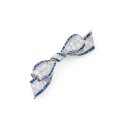Broche nœud Art Déco platine, diamant, saphirs calibrés