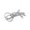 Broche nœud vintage avec diamants