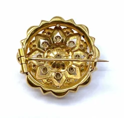 Broche or 18 carats sertie de perles