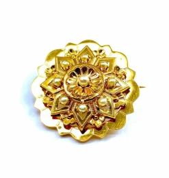 Broche or 18 carats sertie de perles