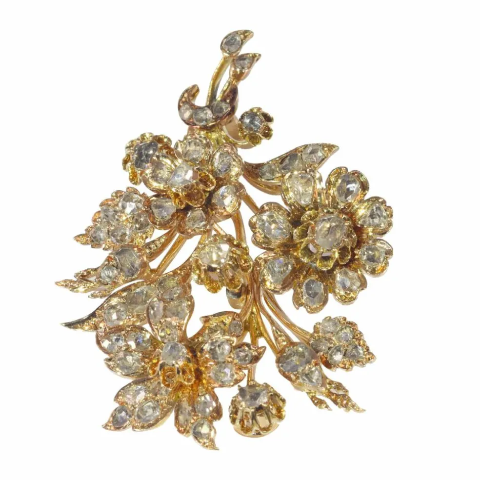 Broche or diamant