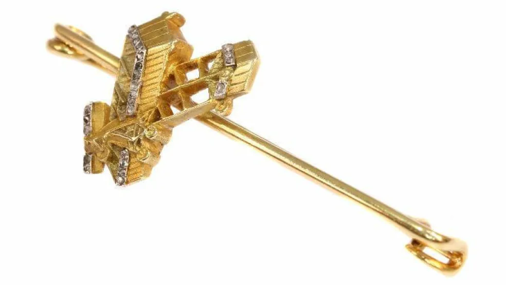 Broche or diamant