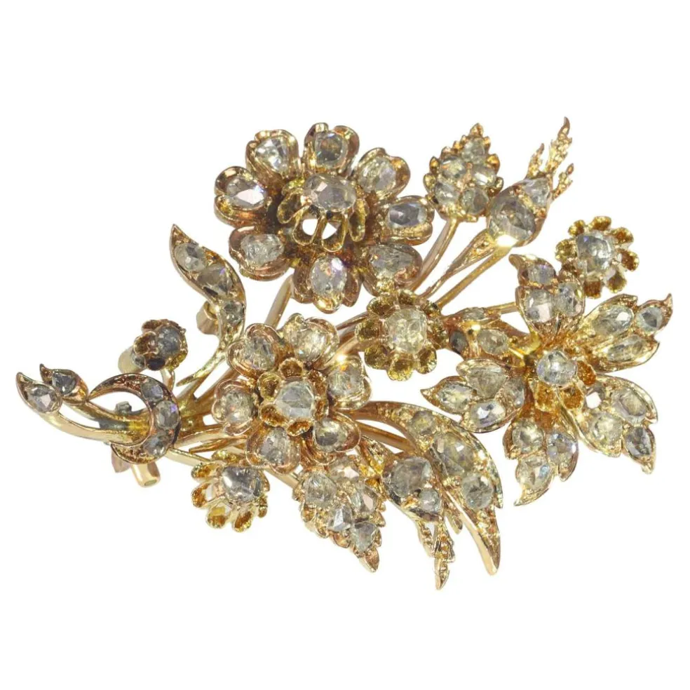 Broche or diamant