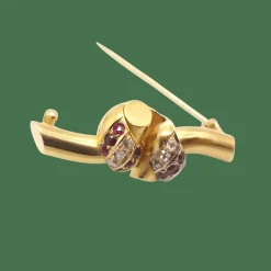 Broche or diamants et rubis