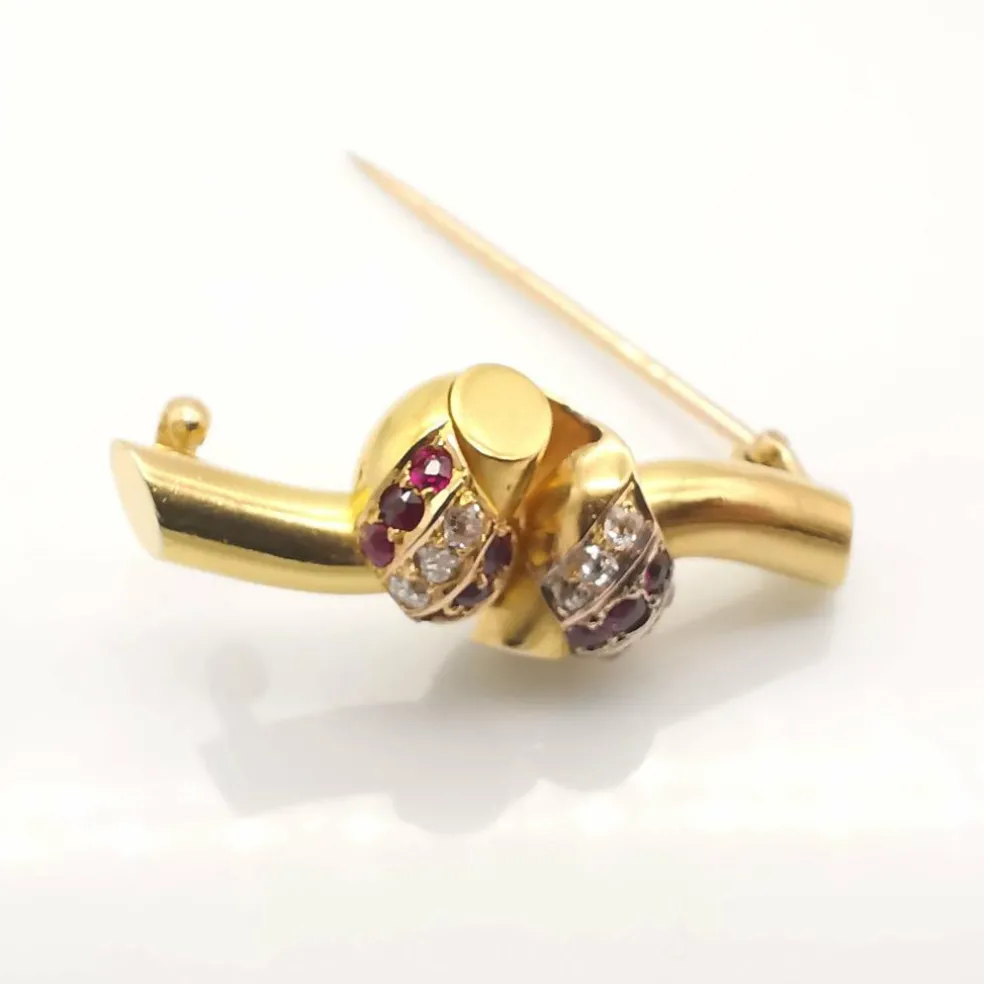 Broche or diamants et rubis