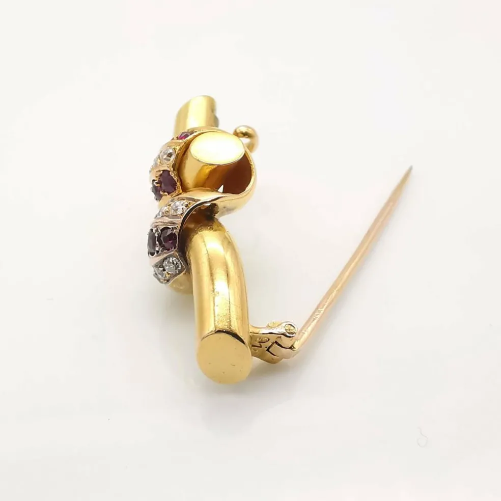 Broche or diamants et rubis