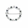 Broche or gris, pierre blanches et saphirs