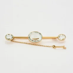 Broche or jaune aigues-marines
