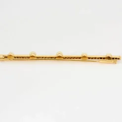 Broche or jaune et perles