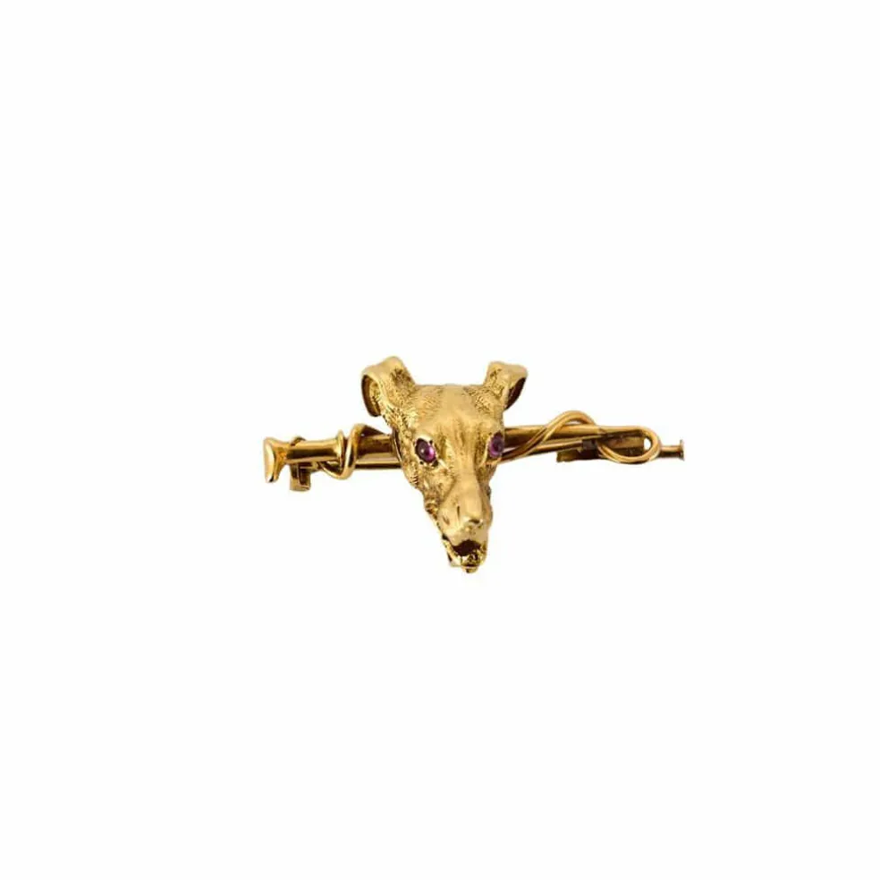 Broche or jaune et rubis à motif de lévrier