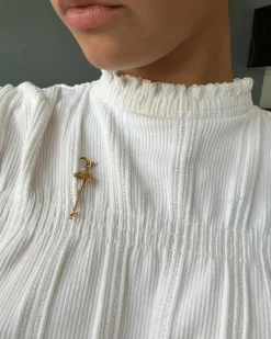Broche or jaune tête de cheval et fouet