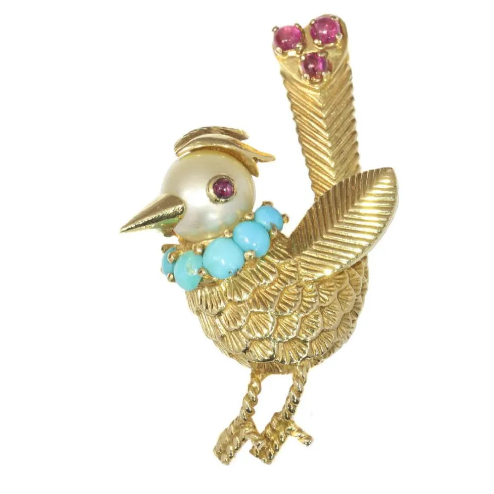 Broche ornée de bijoux