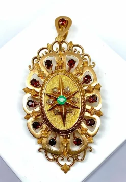 Broche pendentif or, grenats, émeraude, diamants