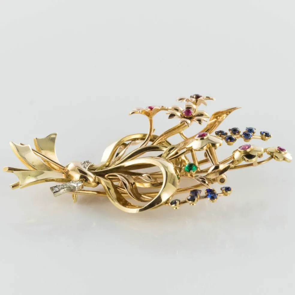 Broche rétro bouquet or et pierres précieuses