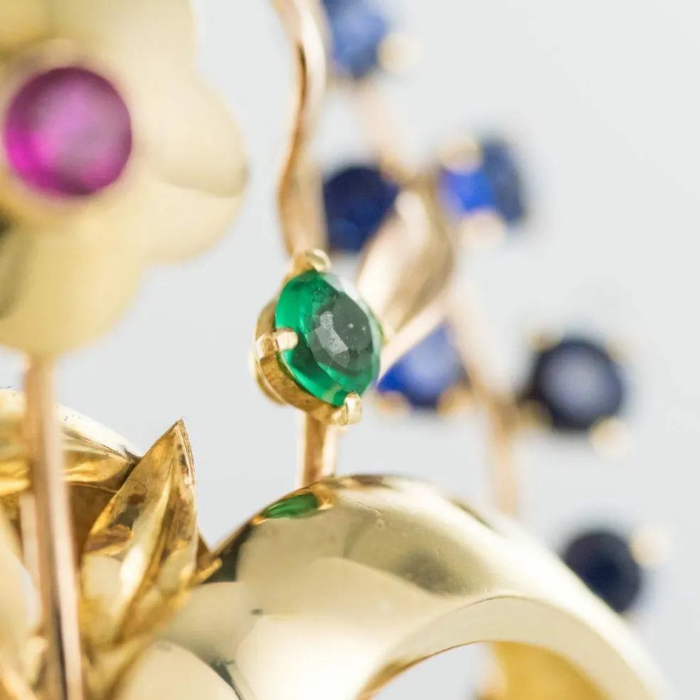 Broche rétro bouquet or et pierres précieuses