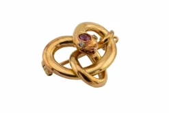 Broche serpent en or jaune avec rubis et diamants