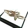 Broche serpent émeraudes