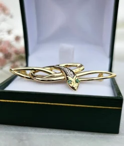 Broche serpent émeraudes