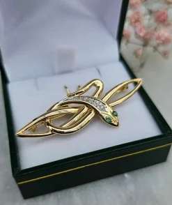 Broche serpent émeraudes