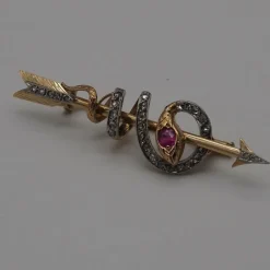 Broche serpent or jaune rubis diamants
