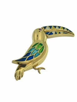 Broche toucan vintage en or jaune avec émail et rubis