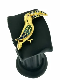 Broche toucan vintage en or jaune avec émail et rubis