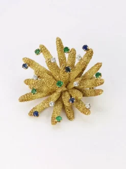 Broche vintage anémone or jaune diamants émeraudes saphirs