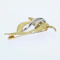 Broche vintage en or amati et diamants