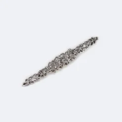 Broche vintage en or blanc