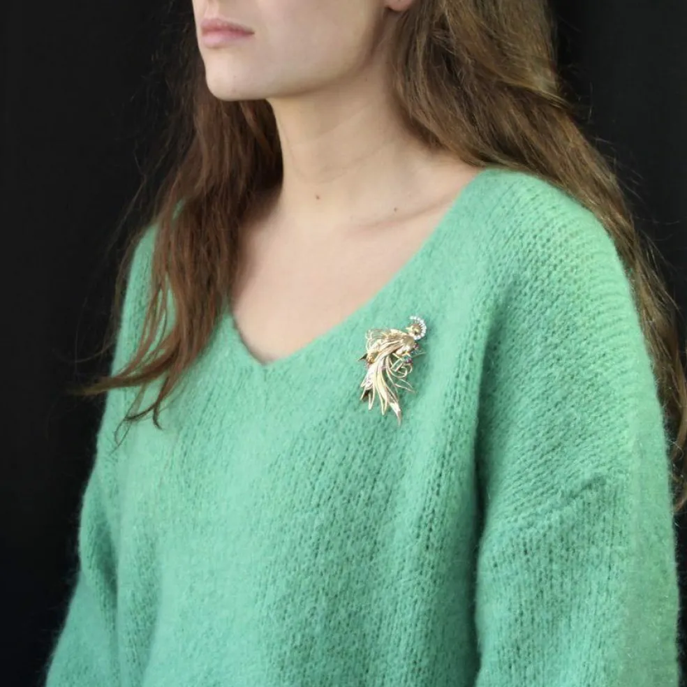 Broche vintage oiseau de paradis diamants émeraudes rubis