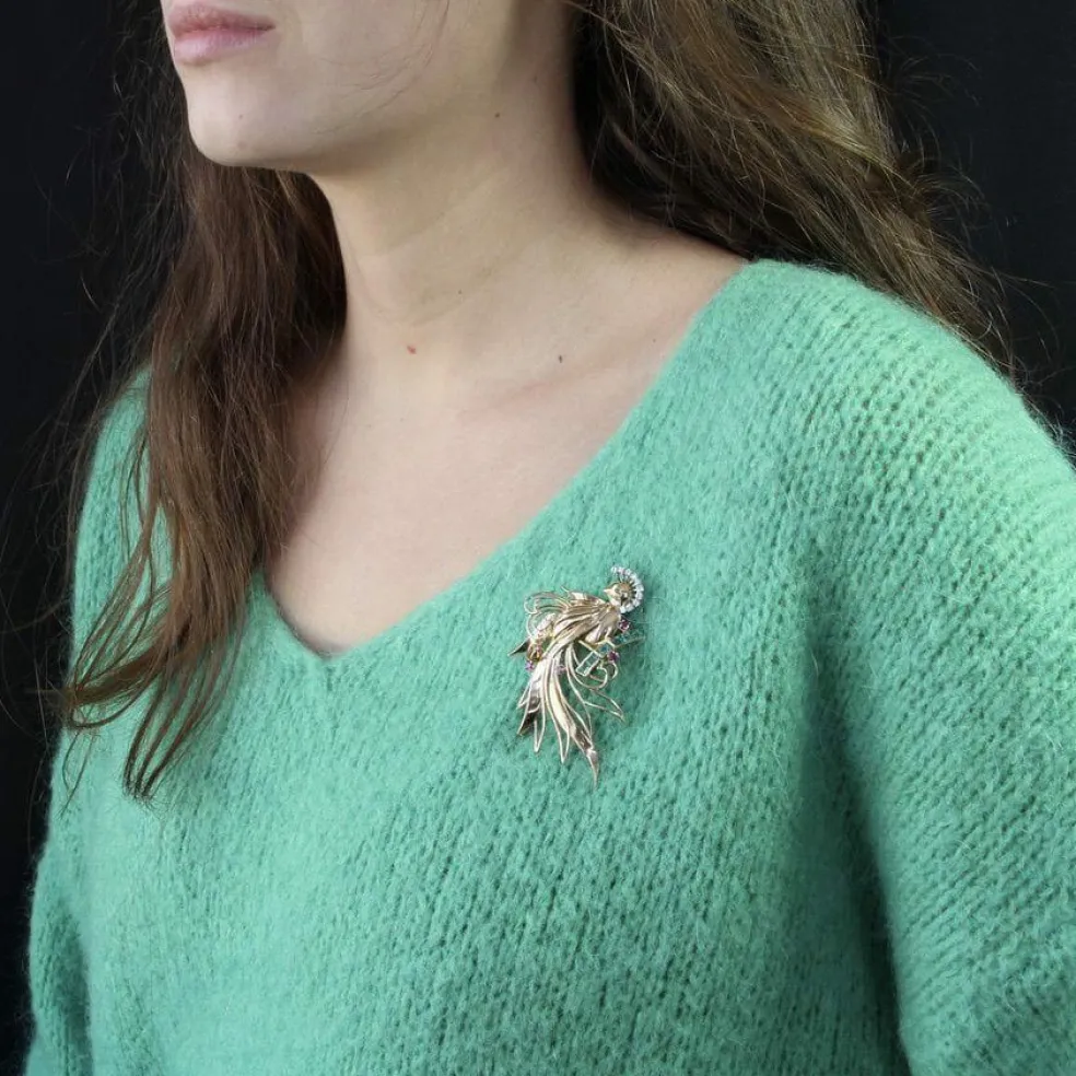 Broche vintage oiseau de paradis diamants émeraudes rubis