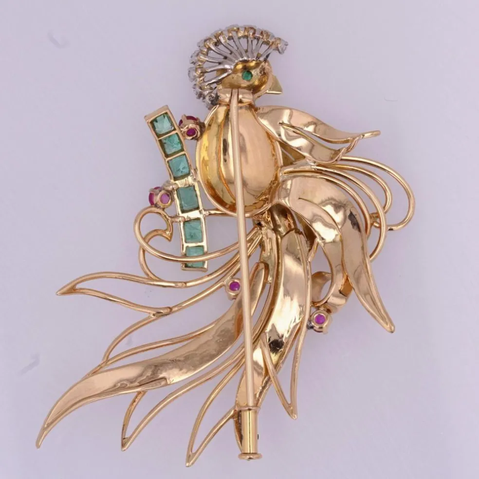 Broche vintage oiseau de paradis diamants émeraudes rubis