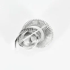 Broche volutes platine et or blanc