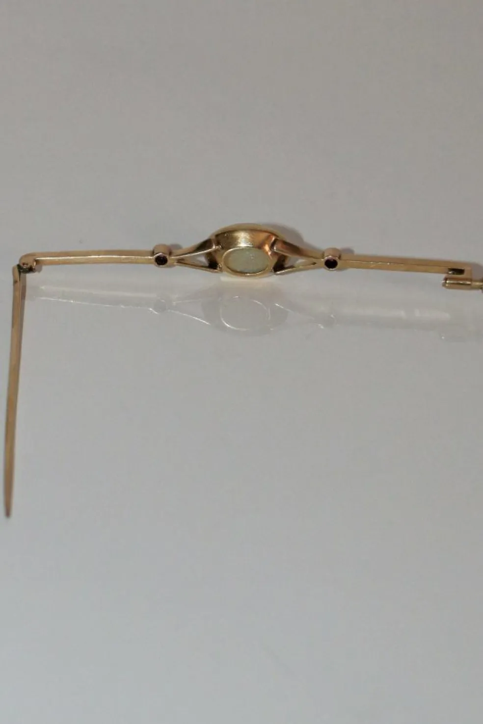 Broche-barrette Art Déco opale et rubis