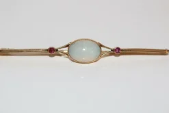 Broche-barrette Art Déco opale et rubis