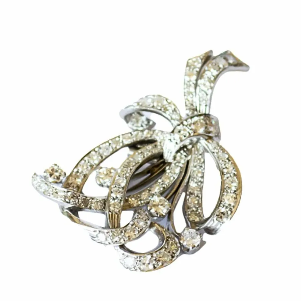 Broches à revers en platine au design rétro avec diamants