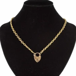 Chaine ancienne ciselée et son cadenas en forme de coeur