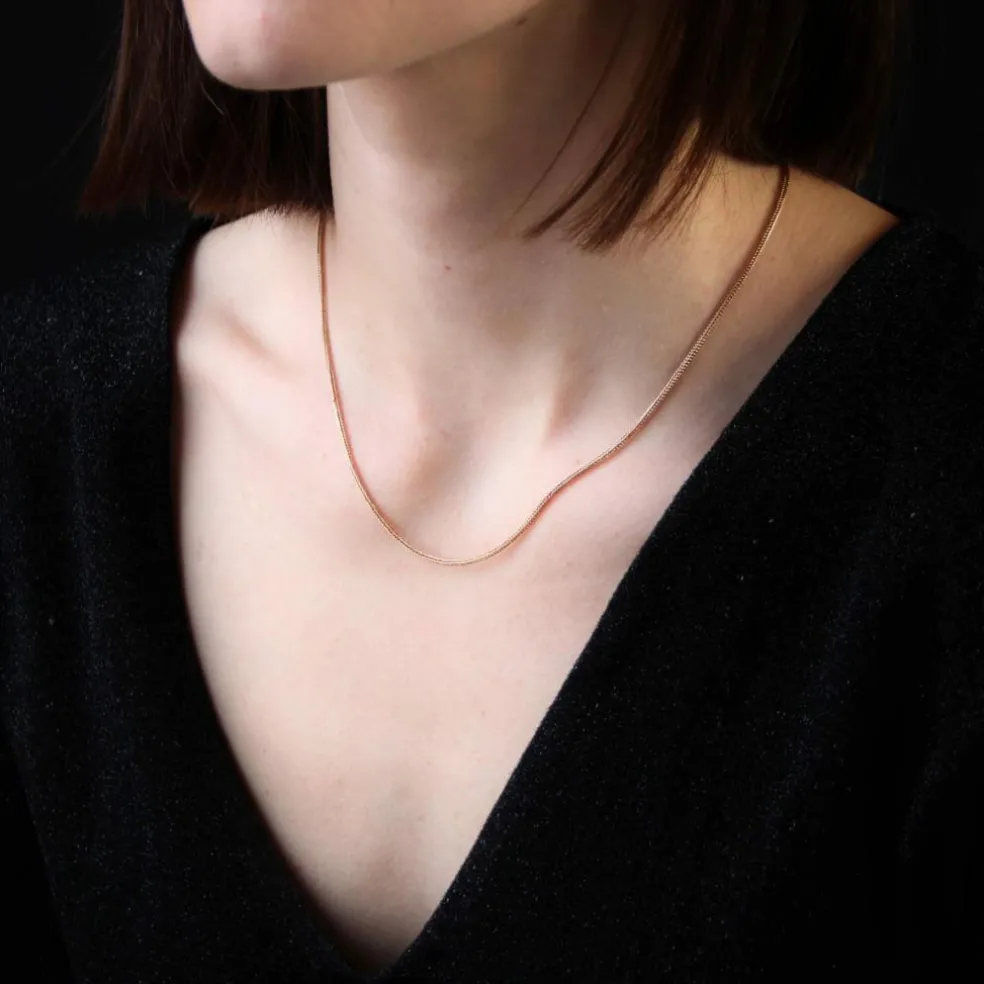 Chaine ancienne maille palmier or rose