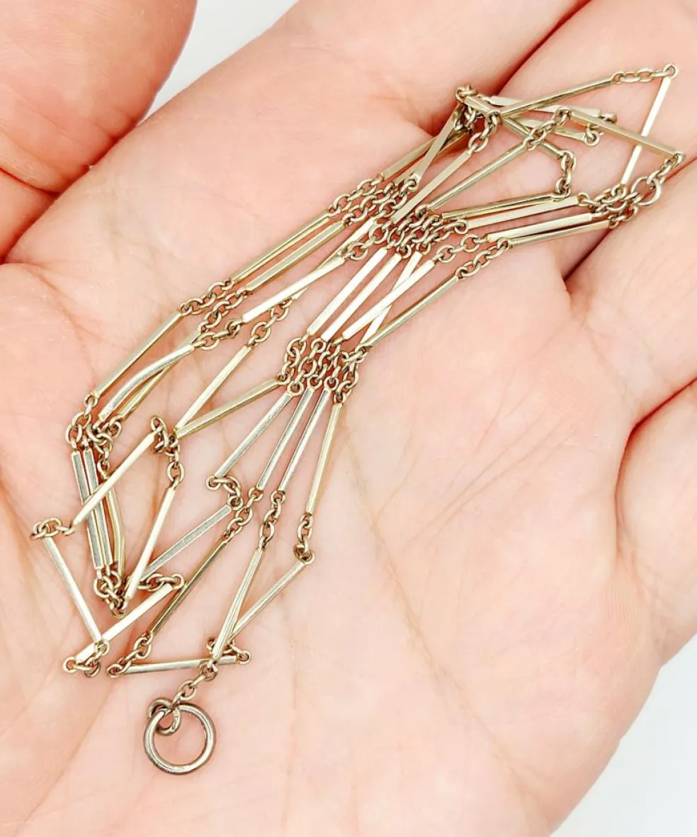 Chaine sautoir antique or blanc à maille bâtonnets finement travaillés