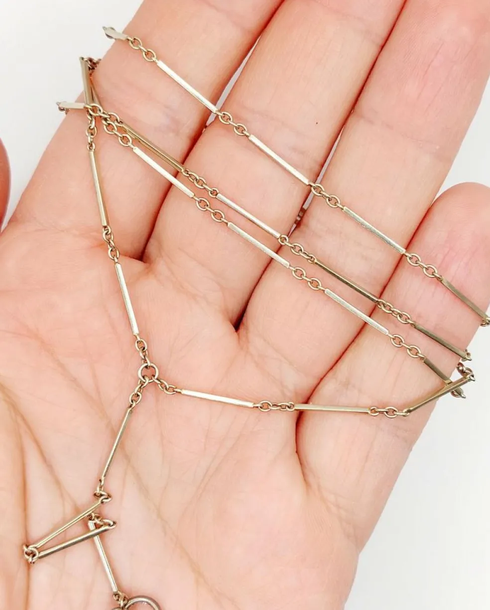 Chaine sautoir antique or blanc à maille bâtonnets finement travaillés