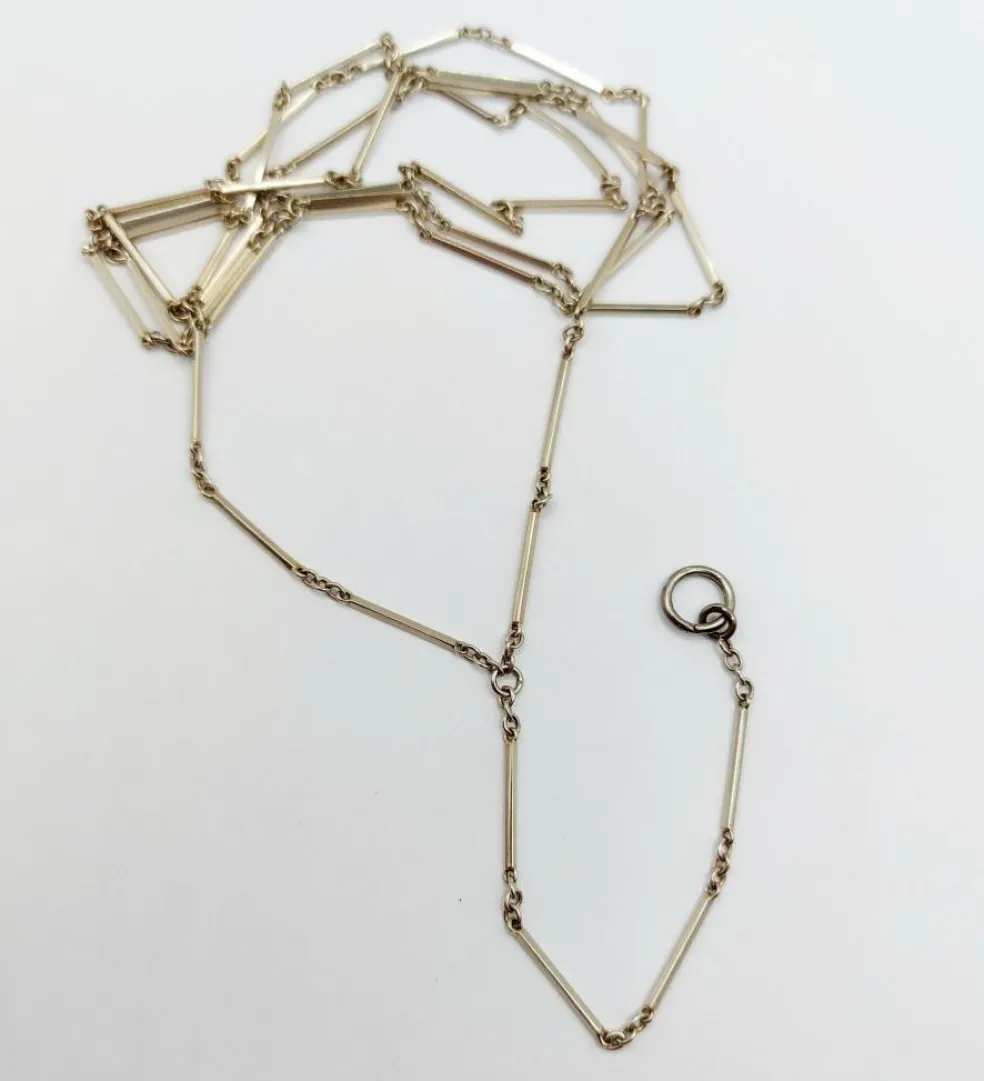 Chaine sautoir antique or blanc à maille bâtonnets finement travaillés