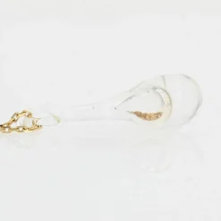 Chaîne en or et son pendentif en verre et paillettes dorées
